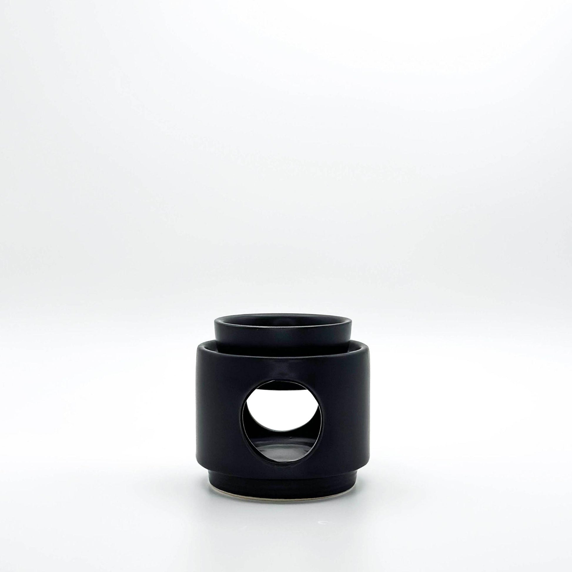 Modern, minimalist ceramic tea light burner